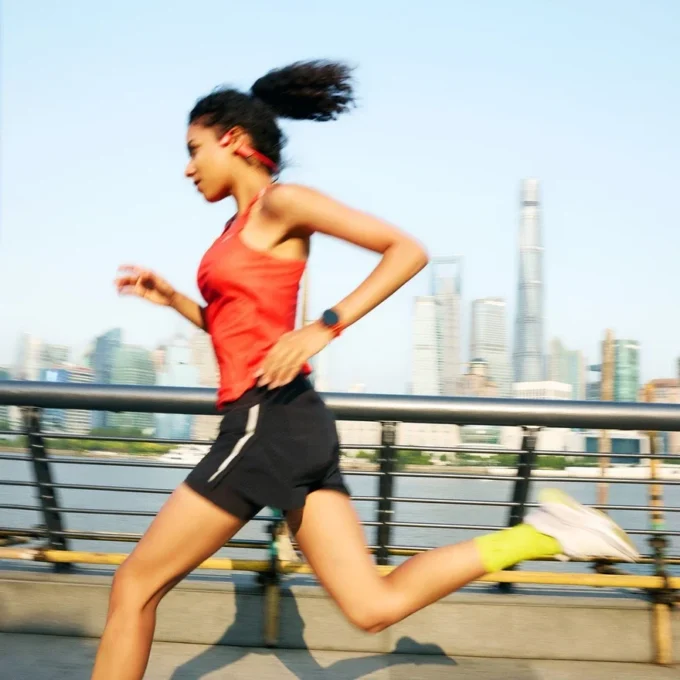 Suunto Run orange corail avec bracelet en silicone